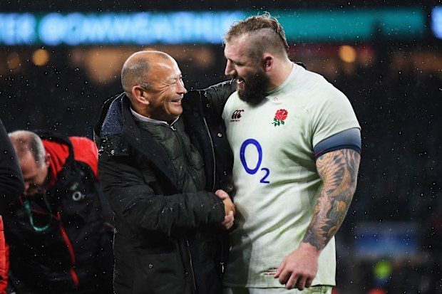 Eddie Jones congratulates Joe Marler of England.