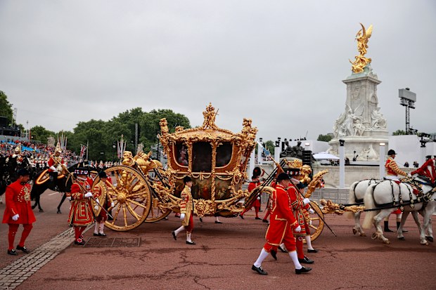 A hologram of Queen Elizabeth II during her coronation is projected in the Gold State Coach as it passes in front of Buckingham Palace during the Platinum Jubilee Pageant in front of Buckingham Palace, on day four of the Platinum Jubilee celebrations on June 05, 2022 in London, England. 