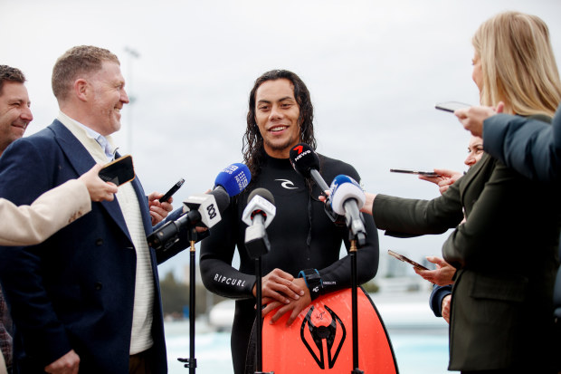 Blues player Jerome Luai speaks with the media after being rescued by lifeguards at Urbnsurf.