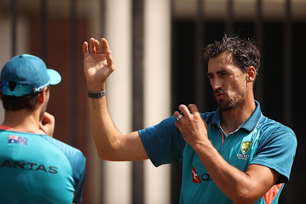 DELHI, INDIA - FEBRUARY 24: Lance Morris of Australia speaks with Mitchell Starc during an Australia Test squad training session at Arun Jaitley Stadium on February 24, 2023 in Delhi, India. (Photo by Robert Cianflone/Getty Images)