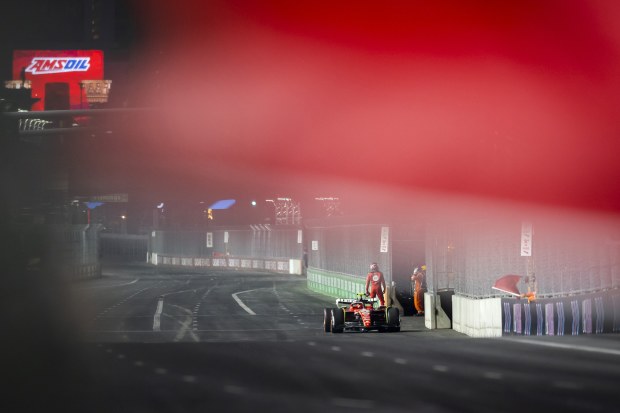 LAS VEGAS, NEVADA - NOVEMBER 16: The car of Carlos Sainz of Spain and Ferrari is removed from the circuit after stopping on track during practice ahead of the F1 Grand Prix of Las Vegas at Las Vegas Strip Circuit on November 16, 2023 in Las Vegas, Nevada. (Photo by Chris Graythen/Getty Images