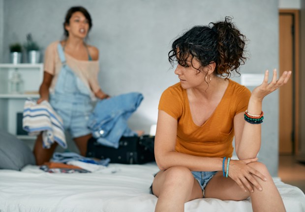 Young couple having relationship difficulties and arguing at home.