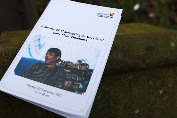 MANCHESTER, ENGLAND - DECEMBER 22:  General View of the funeral order of service booklet at the funeral of Gary Mounfield, also known as Mani, at Manchester Cathedral on December 22, 2025 in Manchester, England. Mani is know for being the bass guitarist in rock bands The Stone Roses and Primal Scream. He died on November 20, 2025 at the age of 63 after suffering from a long-standing lung condition.  (Photo by Ryan Jenkinson/Getty Images)