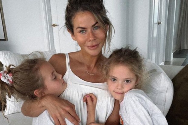 Influencer Sophie Guidolin with her twin daughters.