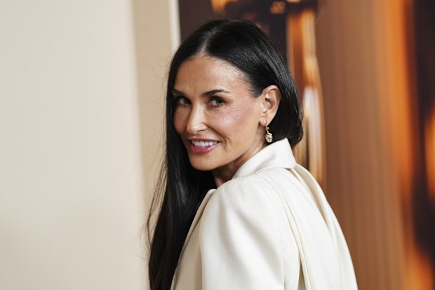 Demi Moore arrives at the Oscars Nominees Dinner on Tuesday, Feb. 25, 2025, at the Academy Museum of Motion Pictures in Los Angeles. 
