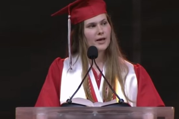 Paxton Smith took to the podium to deliver the valedictorian address at Lake Highlands High School in Dallas, Texas. 