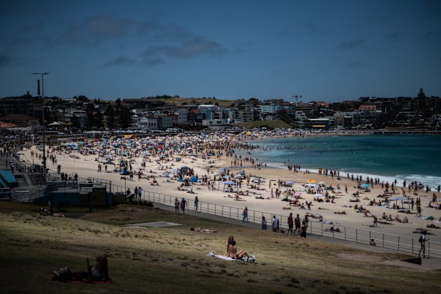 Beachgoers are seen at Bondi Beach in Sydney, on DEC 27, 2022. Photo Flavio Brancaleone /The Sydney Morning Herald