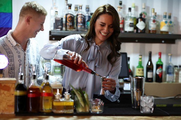 Catherine, Princess of Wales makes a cocktail as she visits the Trademarket outdoor market, as part of the royal visit to Northern Ireland on October 6, 2022 in Belfast, Northern Ireland 