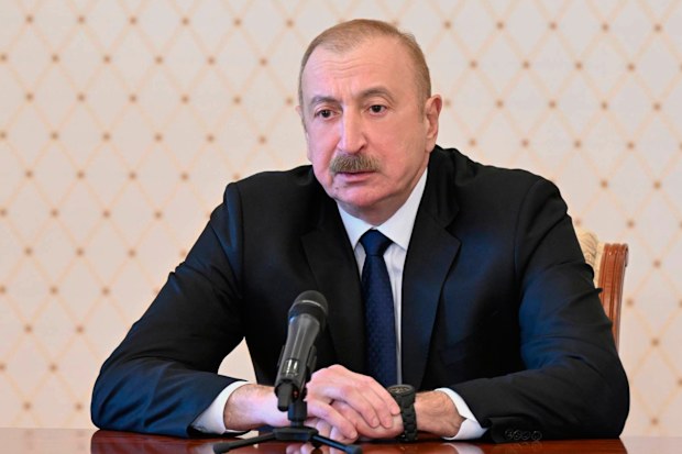 In this photo provided by Azerbaijan's Presidential Press Service, Azebaijan's President Ilham Aliyev chairs a Security Council meeting in Baku, Azerbaijan, Thursday, March 5, 2026.