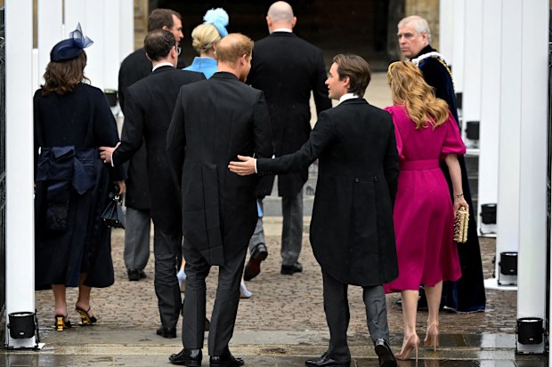 LONDON, ENGLAND - MAY 06:  Prince Harry, Duke of Sussex arrives with Princess Beatrice and her husband Edoardo Mapelli Mozzi to attend the Coronation of King Charles III and Queen Camilla on May 6, 2023 in London, England. The Coronation of Charles III and his wife, Camilla, as King and Queen of the United Kingdom of Great Britain and Northern Ireland, and the other Commonwealth realms takes place at Westminster Abbey today. Charles acceded to the throne on 8 September 2022, upon the death of hi