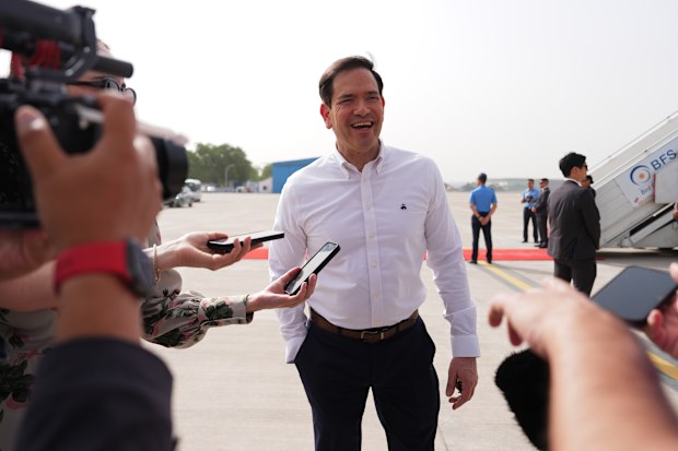 United States Secretary of State Marco Rubio speaks to the journalists before boarding his plane at Indira Gandhi International Airport in New Delhi, India, Monday, May 25, 2026. (AP Photo/Julia Demaree Nikhinson, Pool)