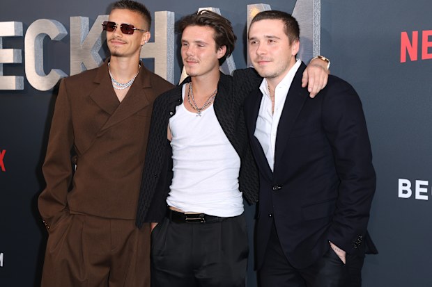 LONDON, ENGLAND - OCTOBER 03: Romeo Beckham, Cruz Beckham and Brooklyn Peltz Beckham attend the Netflix 'Beckham' UK Premiere at The Curzon Mayfair on October 03, 2023 in London, England. (Photo by Lia Toby/Getty Images)