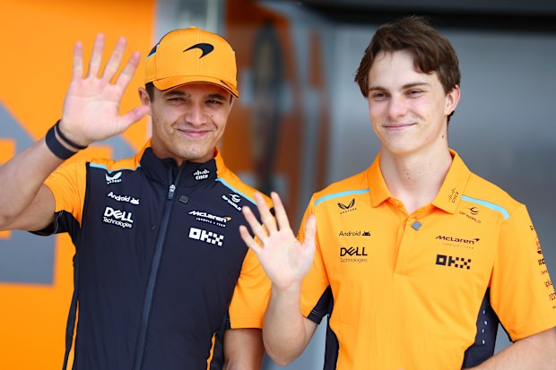 Lando Norris of Great Britain and McLaren and Oscar Piastri of Australia and McLaren look on in the pitlane during previews ahead of the F1 Grand Prix of Japan at Suzuka International Racing Course on April 04, 2024 in Suzuka, Japan. (Photo by Clive Rose - Formula 1/Formula 1 via Getty Images)