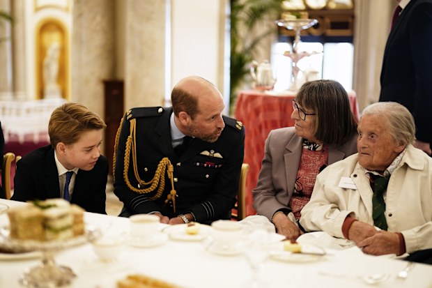 Prince William, Prince of Wales and Prince George join Second World War veterans at a tea party in Buckingham Palace following the military procession to mark the 80th anniversary of VE Day on May 5, 2025 in London, England. 