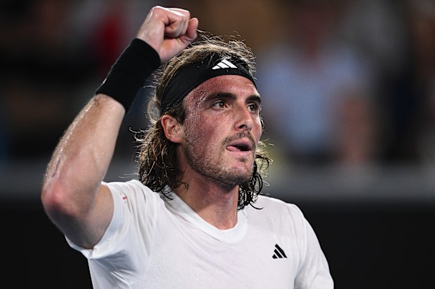 Stefanos Tsitsipas celebrates first round win at the Australian Open.