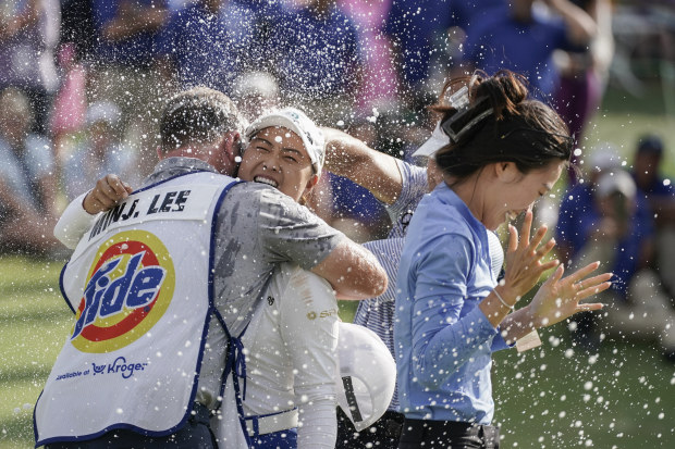 Minjee Lee is doused with champagne after winning the LPGA Kroger Queen City Championship.