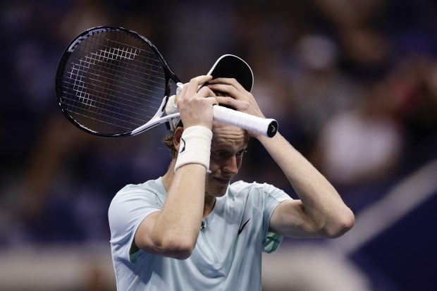 Jannik Sinner reacts during his fourth-round match against Alexander Zverev at the US Open.