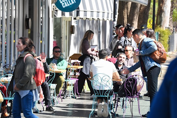 Waiters tending tables customers Surry Hills staff shortages.