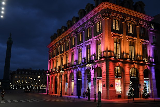 The facade of the Louis Vuitton store on Place Vendome is illuminated for Christmas and New Year celebrations on November 21, 2020 in Paris, France.  (Photo by Pascal Le Segretain/Getty Images)
