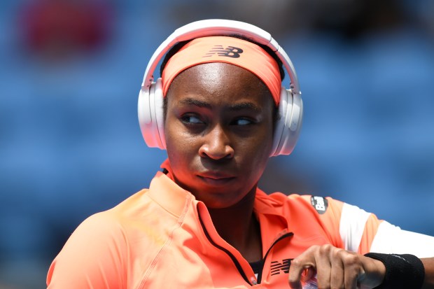 Coco Gauff of United States wears her headphones as she walks on court to play at her fourth round singles match against Jelena Ostapenko of Latvia during day seven of the 2023 Australian Open at Melbourne Park on January 22, 2023 in Melbourne, Australia. (Photo by James D. Morgan/Getty Images)