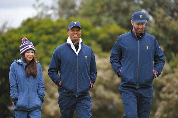 Erica Herman and Tiger Woods during the third round at the Presidents Cup at The Royal Melbourne Golf Club on December 14, 2019, in Victoria , Australia.