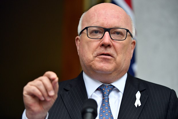 George Brandis at a press conference at Parliament House in Canberra. (AAP)
