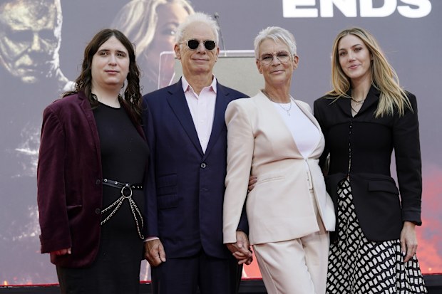 Actor Jamie Lee Curtis, second from right, poses with her husband Christopher Guest, second from left, and their daughters Ruby, far left, and Annie during a hand and footprint ceremony for Curtis at TCL Chinese Theatre, Wednesday, Oct. 12, 2022, in Los Angeles. (AP Photo/Chris Pizzello)