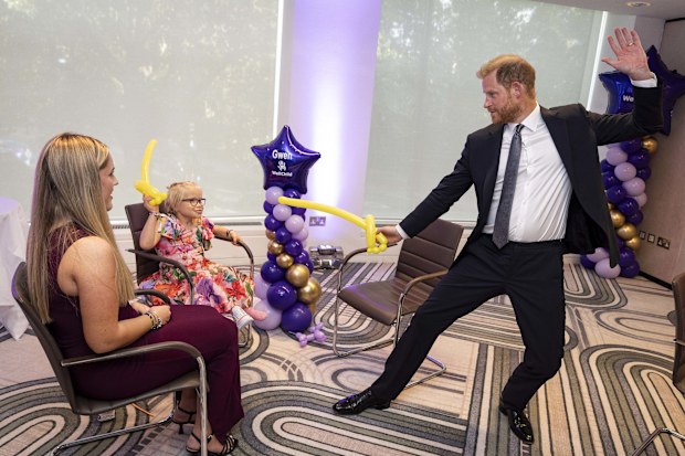 LONDON, ENGLAND - SEPTEMBER 8: Prince Harry, Duke of Sussex speaks with 13-year-old Ansel Hayward (left), recipient of the Inspirational Young Person 12-14 award, at the annual WellChild Awards 2025, which celebrates the achievements and resilience of seriously ill youngsters and their families, at the Royal Lancaster Hotel on September 8, 2025 in London, England. (Photo by Aaron Chown - Pool/Getty Images)