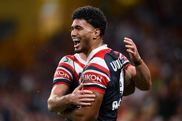 BRISBANE, AUSTRALIA - MAY 02: Robert Toia of the Roosters celebrates with team mates after scoring a try during the round nine NRL match between the Sydney Roosters and Dolphins at Suncorp Stadium on May 02, 2025, in Brisbane, Australia. (Photo by Hannah Peters/Getty Images)