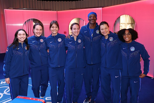 Maia Weintraub, Jacqueline Debruvich, Anne Cebula, Margherita Guzzi Vincenti, Snoop Dogg, Katherine Holmes and Lauren Scruggs attend the Team USA Welcome Experience ahead of Paris 2024 Summer Olympics on July 20, 2024 in Paris, France.