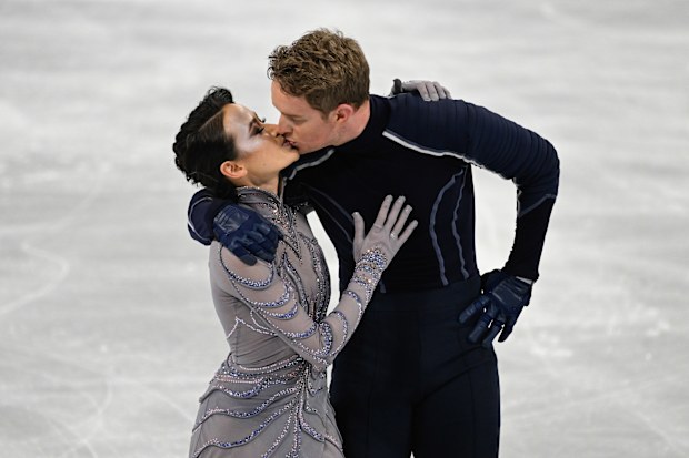 Madison Chock and Evan Bates share a kiss during the Beijing 2022 Winter Olympics on February 7, 2022.