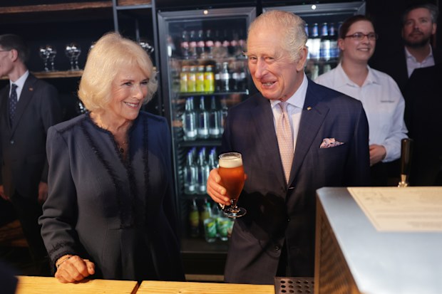 King Charles III and Camilla, Queen Consort toast to their final reception at Schuppen 52 on March 31, 2023 in Hamburg, Germany.  