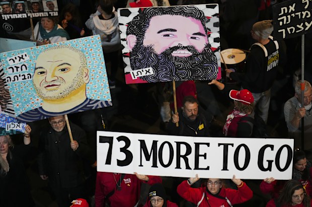 Protesters demanding the immediate release of hostages held by Hamas in the Gaza Strip, in Tel Aviv, Israel, Saturday, Feb. 15, 2025. (AP Photo/Ohad Zwigenberg)