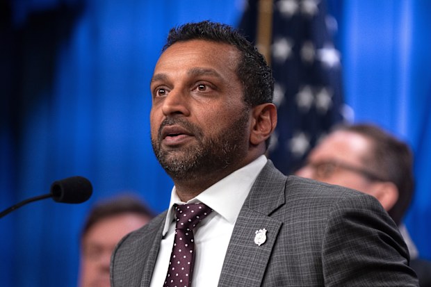 FBI Director Kash Patel speaks with reporters during a news conference at the Department of Justice, Wednesday, Nov. 19, 2025, in Washington. (AP Photo/Mark Schiefelbein)