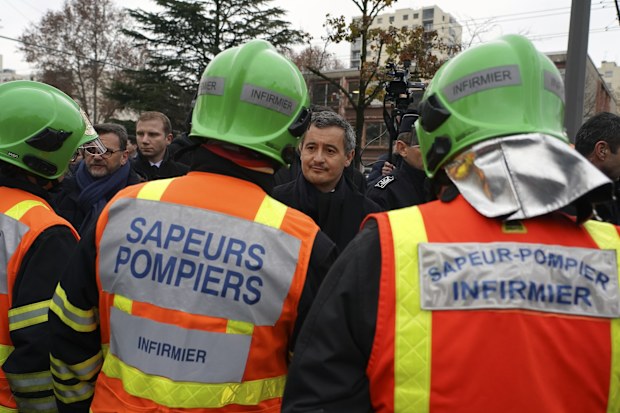 French Interior Minister Gerald Darmanin salutes firefighters brigade in Vaulx en Velin.
