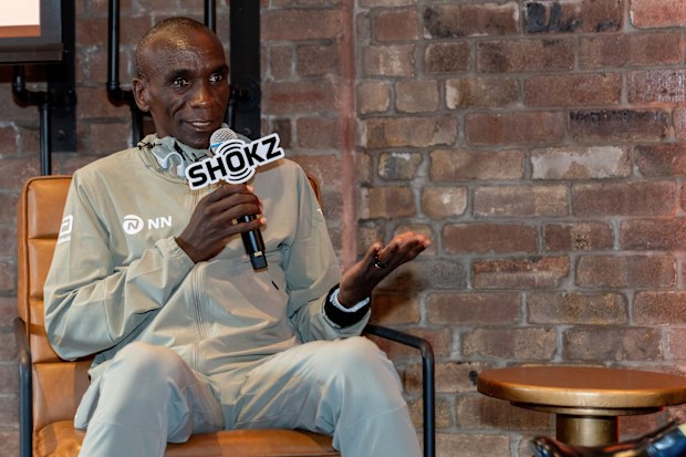 Eliud Kipchoge speaking at a Shokz event on his trip to Sydney.