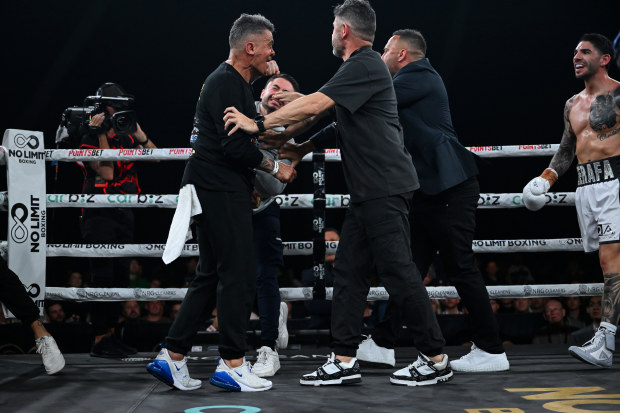 Michael Zerafa's brother whacks Tommy Mercuri in the ring.