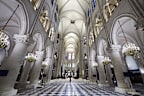 The nave of Notre-Dame de Paris cathedral is seen while French President Emmanuel Macron visits the restored interiors of the cathedral, Friday Nov. 29, 2024, in Paris.  
