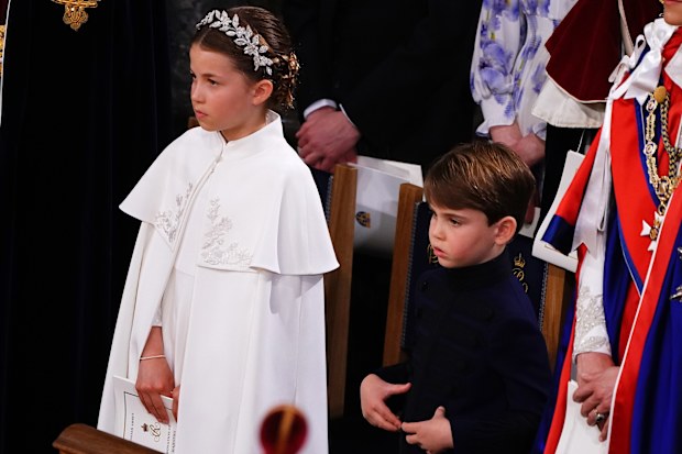 LONDON, ENGLAND - MAY 06: Princess Charlotte and Prince Louis at the coronation ceremony of King Charles III and Queen Camilla in Westminster Abbey on May 6, 2023 in London, England. The Coronation of Charles III and his wife, Camilla, as King and Queen of the United Kingdom of Great Britain and Northern Ireland, and the other Commonwealth realms takes place at Westminster Abbey today. Charles acceded to the throne on 8 September 2022, upon the death of his mother, Elizabeth II. (Photo by Yui Mo