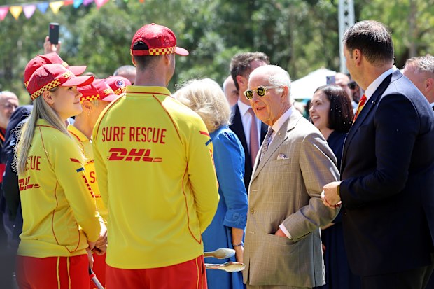 King Charles III and Queen Camilla speak with Surf Life Saving personnel as they attend the Premier's Community Barbeque at Parramatta Park on October 22, 2024 in Sydney, Australia. The King's visit to Australia is his first as monarch, and the Commonwealth Heads of Government Meeting (CHOGM) in Samoa will be his first as head of the Commonwealth. 