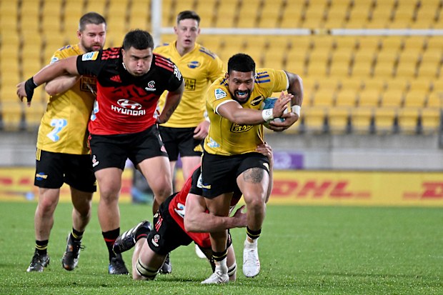 Ardie Savea of the Hurricanes runs with the ball.