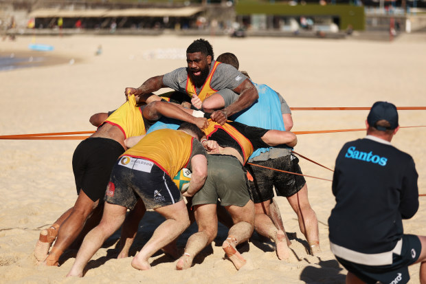 Wallabies players take part in a drill during an Australian Wallabies training session at Coogee Beach.