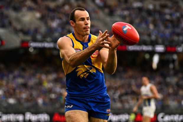 PERTH, AUSTRALIA - JULY 30: Shannon Hurn of the Eagles marks the ball during the 2023 AFL Round 20 match between the West Coast Eagles and the North Melbourne Kangaroos at Optus Stadium on July 30, 2023 in Perth, Australia. (Photo by Daniel Carson/AFL Photos via Getty Images)