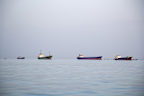 Ships are anchored near the shoreline on April 22, 2026 in Bandar Abbas, Iran. Bandar Abbas is a port city and the capital of Hormozgan Province, along the Persian Gulf and Strait of Hormuz 
