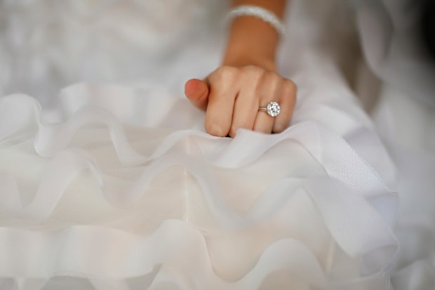 Bride sitting in dress