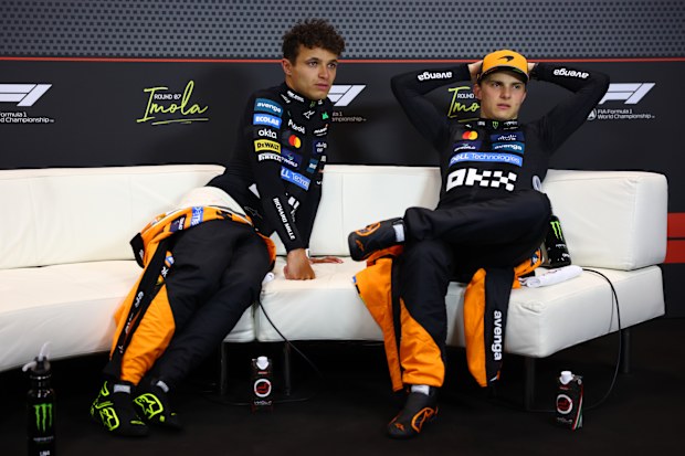 McLaren teammates Lando Norris and Oscar Piastri chat after the Italian Grand Prix.