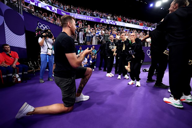 Bronze medalist Alessia Maurelli of Team Italy and Massimo Bertelloni getting engaged after the Rhythmic Gymnastics Group All-Around Final 