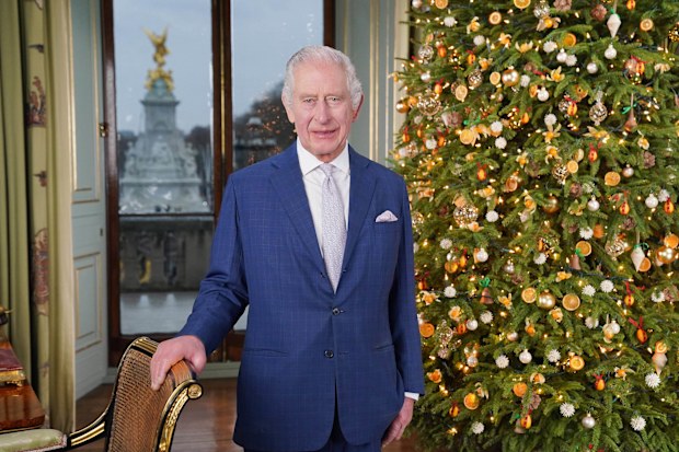 King Charles III during the recording of his Christmas message at Buckingham Palace, London.