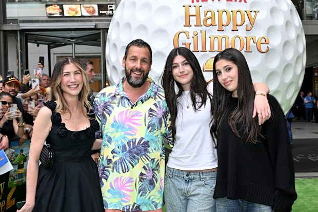 NEW YORK, NEW YORK - JULY 21: (L-R) Jackie Sandler, Adam Sandler, Sunny Sandler and Sadie Sandler attend the Happy Gilmore 2 World Premiere at Jazz at Lincoln Center on July 21, 2025 in New York City. (Photo by Roy Rochlin/Getty Images for Netflix)