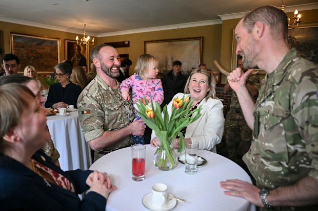 BULFORD, WILTSHIRE - MARCH 26: Prince William, Prince of Wales (R) as Colonel-in-Chief of the Regiment meets with soldiers of the 1st Battalion Mercian Regiment and family members following their six-month deployment to Estonia, on March 26, 2026 in Bulford, Wiltshire, England  (Photo by Justin Tallis-WPA Pool/Getty Images)